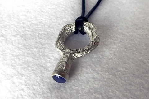 Cuttlebone cast sterling silver pendant with blue Onyx Chalcedony cabochon