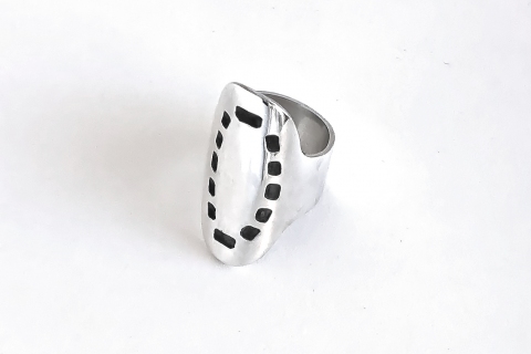 Large sterling sterling ring with square piercing enhanced with black patina